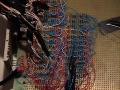 Close-up of dense hand-wiring on the controller board