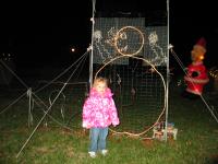 Emily showing the size of the snowmen